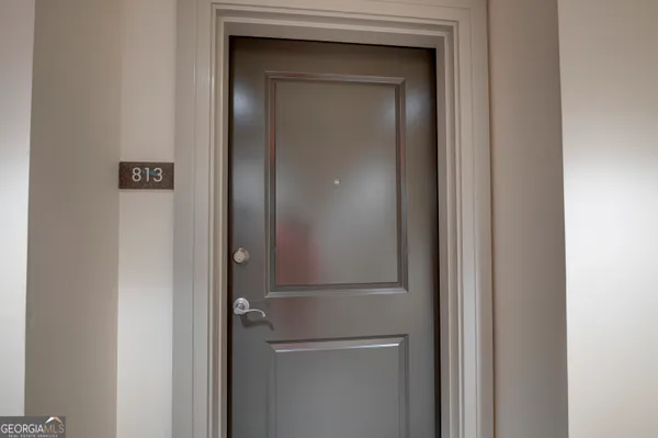 a view of a kitchen cabinets and wooden floor