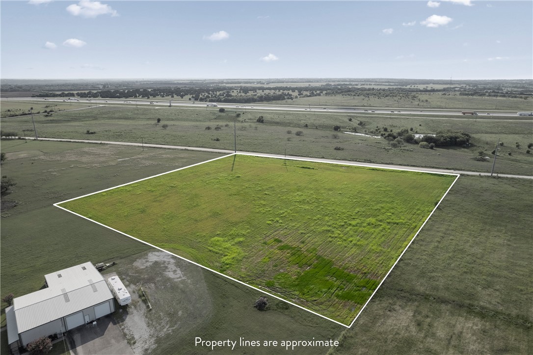 1228 South Old Temple Road Lorena, TX 76655 - Photo 6 of 12 a view of a pool with lawn chairs