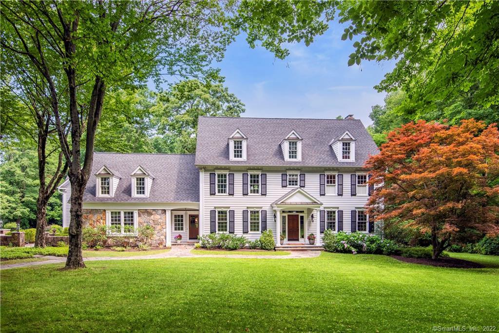 front view of a building with a yard