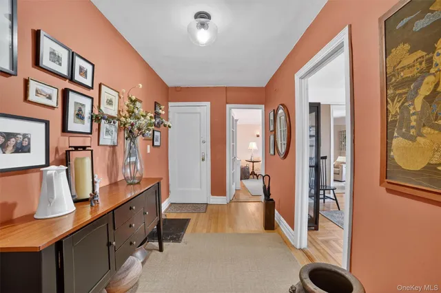 a bathroom with double vanity and a shower
