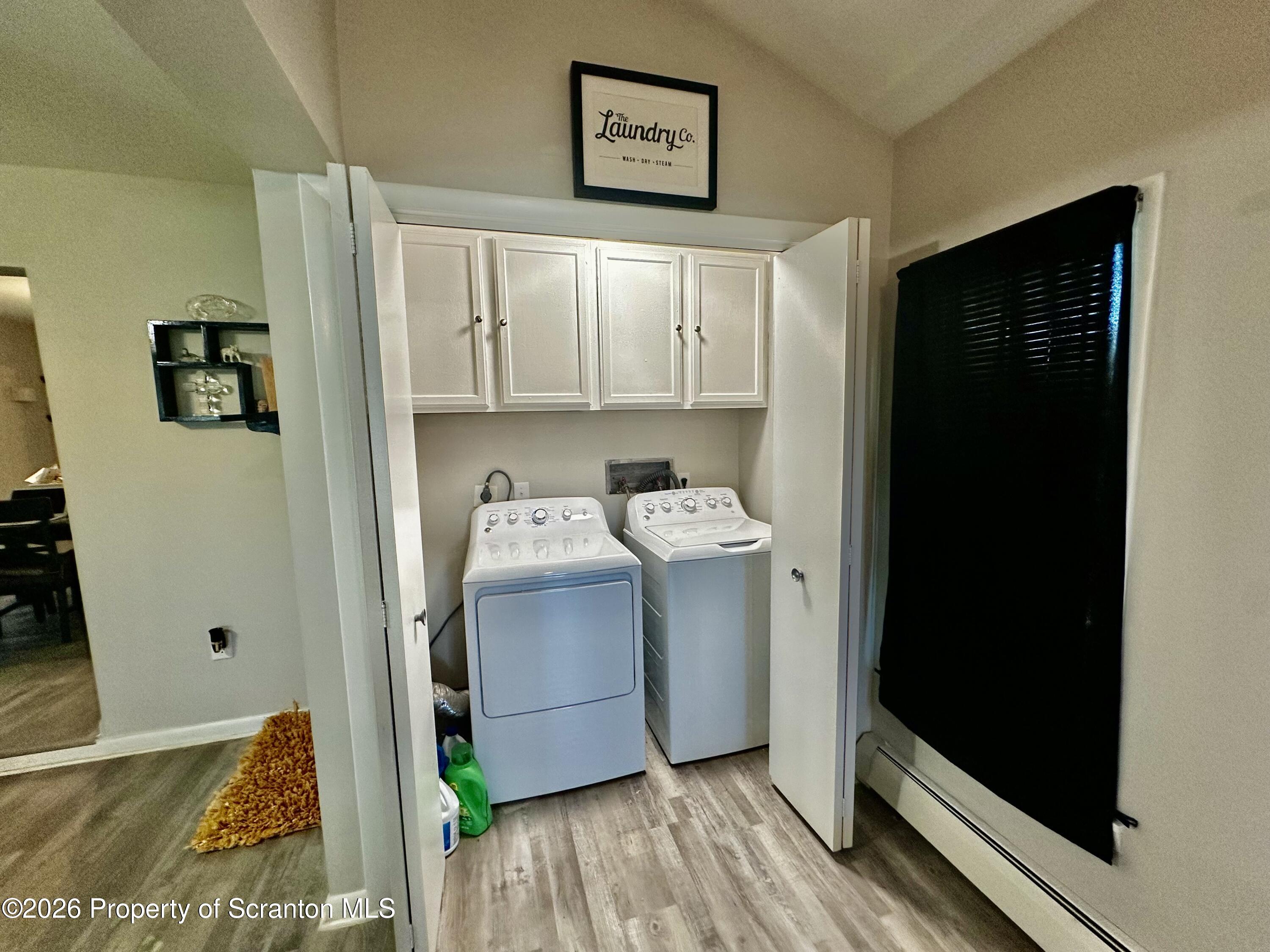1727 Bulwer Street Scranton, PA 18504 - Photo 18 of 40 a view of a hallway with washer and dryer