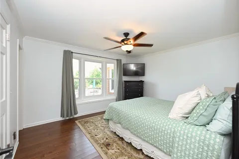 a view of storage and utility room with washer and dryer