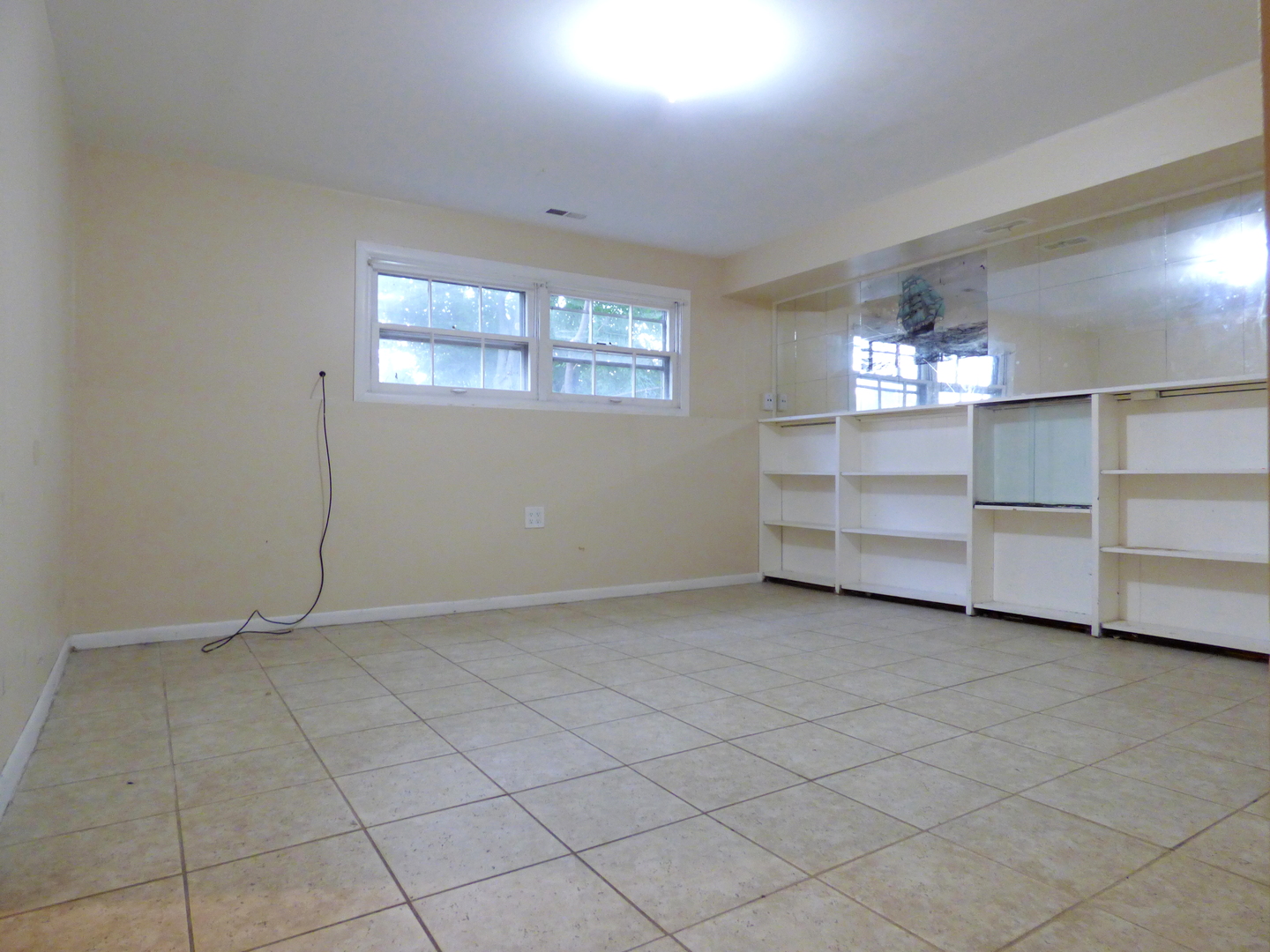 6830 Valley View Road Hanover Park, IL 60133 - Photo 4 of 8 an empty room with shelves
