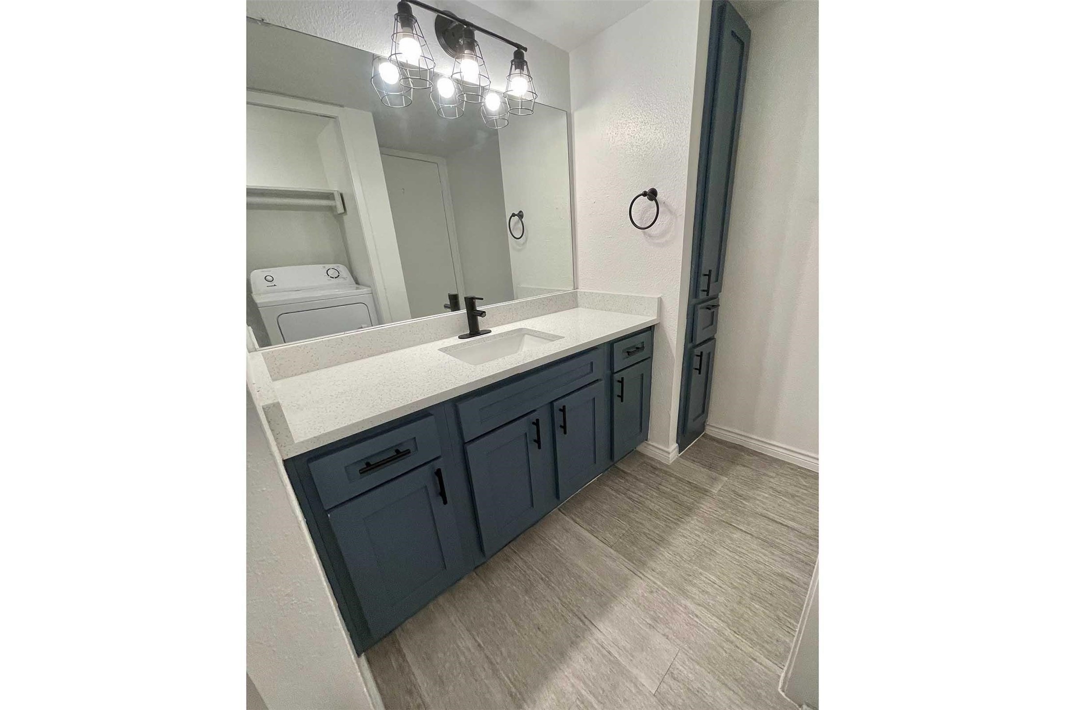 4400 Memorial Drive, Unit 222160 Houston, TX 77007 - Photo 8 of 16 a bathroom with a double vanity sink and mirror
