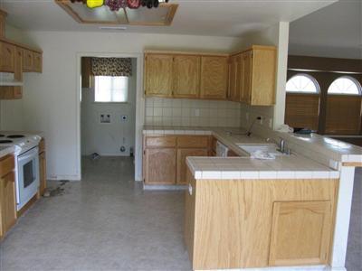 KITCHEN FROM EATING AREA