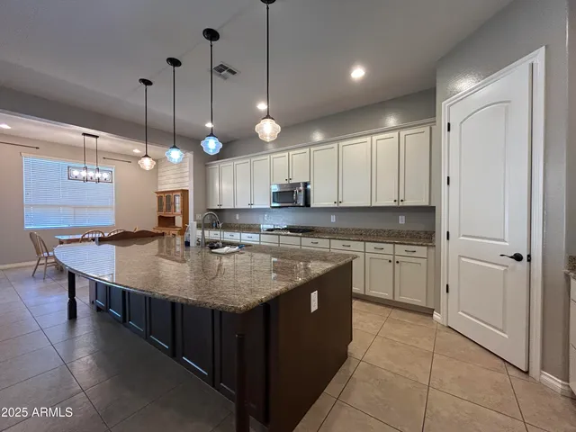 a view of cabinets and window