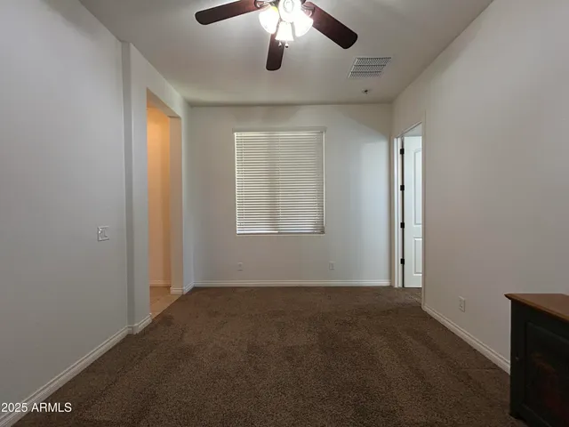 a bathroom with a sink a toilet a mirror and shower