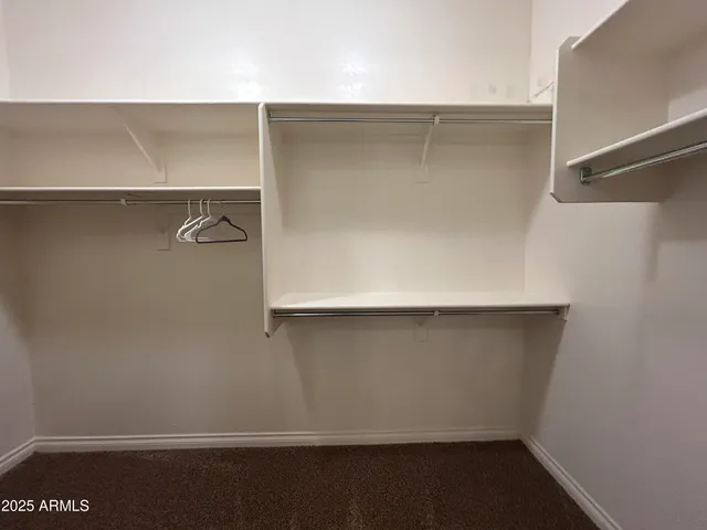 a view of a house with backyard porch and furniture