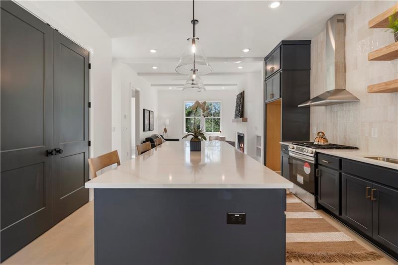 1901 Browns Mill Road Southeast Atlanta, GA 30315 - Photo 11 of 42 a kitchen with stainless steel appliances a sink stove and refrigerator