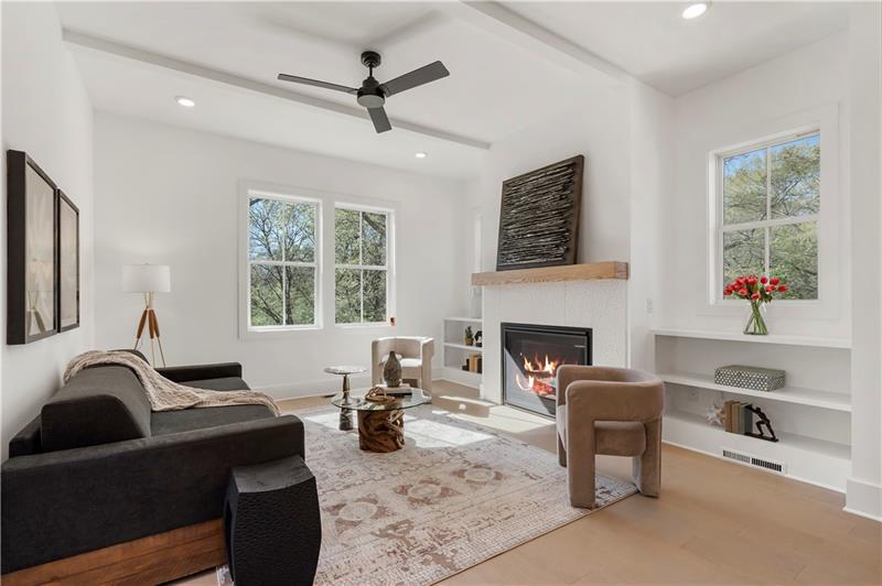 1901 Browns Mill Road Southeast Atlanta, GA 30315 - Photo 17 of 42 a living room with furniture a window and a fireplace
