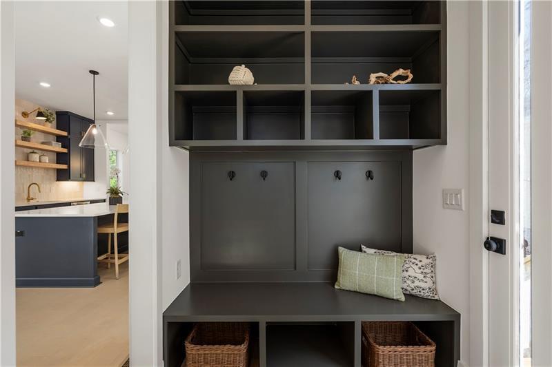 1901 Browns Mill Road Southeast Atlanta, GA 30315 - Photo 20 of 42 a bedroom with a bed and a book shelf