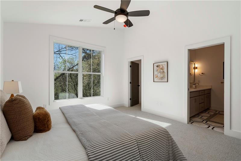 1901 Browns Mill Road Southeast Atlanta, GA 30315 - Photo 24 of 42 a bedroom with a bed and a window