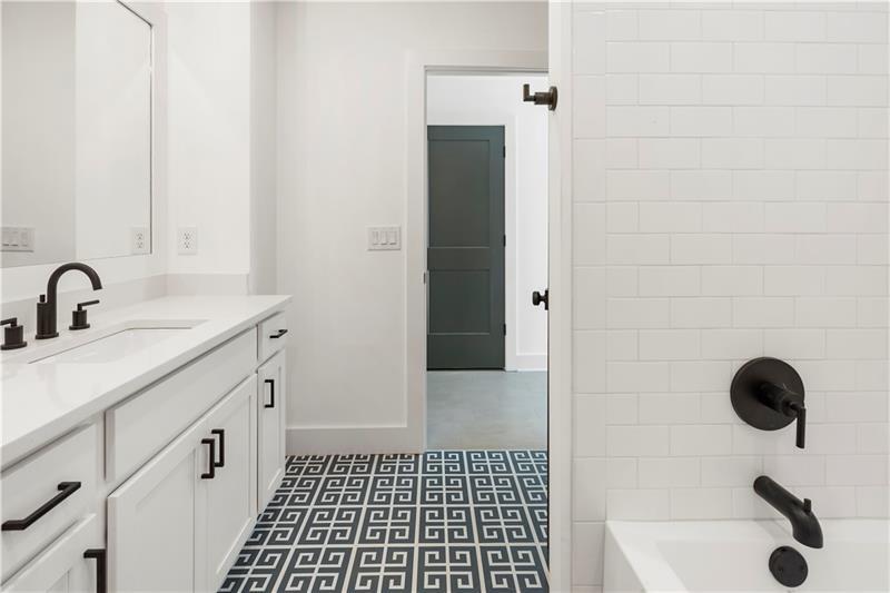 1901 Browns Mill Road Southeast Atlanta, GA 30315 - Photo 32 of 42 a bathroom with a sink and a shower