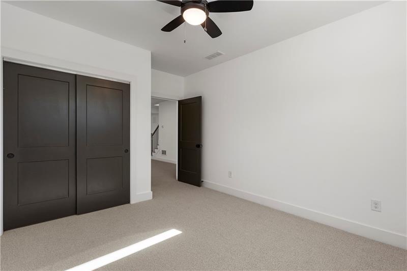 1901 Browns Mill Road Southeast Atlanta, GA 30315 - Photo 40 of 42 an empty room with a ceiling fan