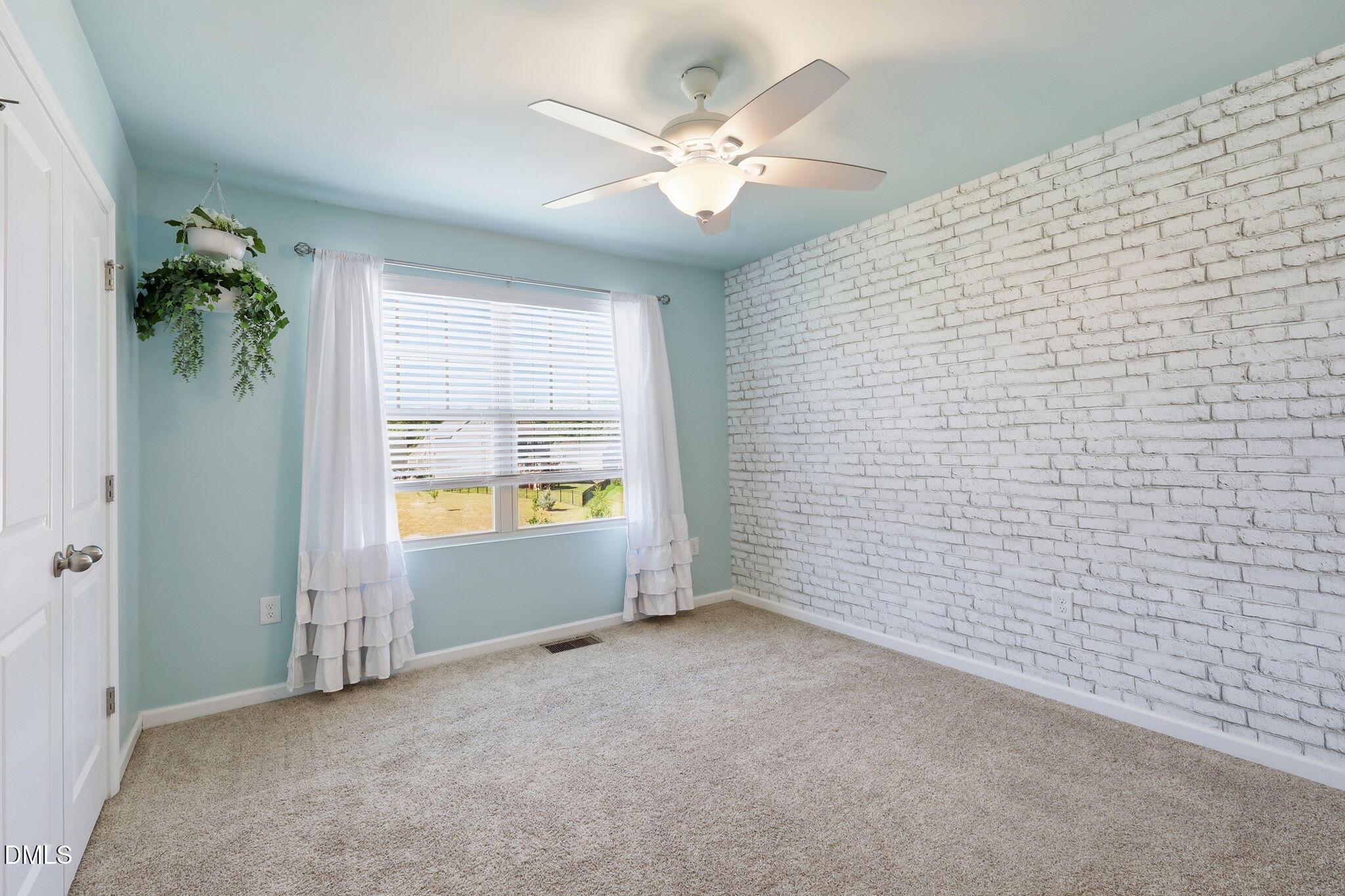 1808 Austin Rdg Parkway Wake Forest, NC 27587 - Photo 29 of 57 en empty room with windows and ceiling fan