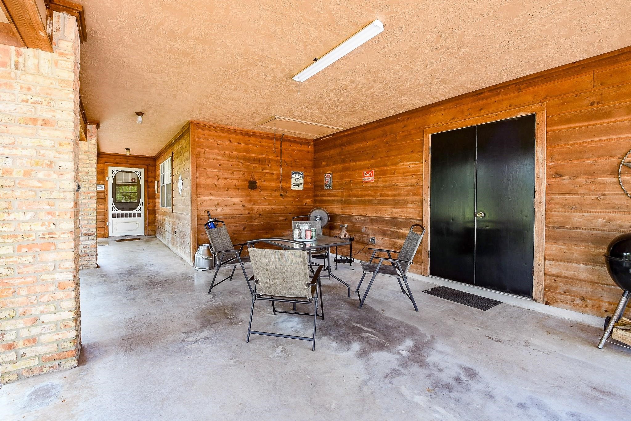 22035 Buescher Road Tomball, TX 77377 - Photo 32 of 43 a view of a house with backyard and sitting area