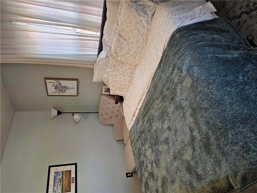 2105 Shroyer Road Dayton, OH 45419 - Photo 12 of 35 This cozy bedroom provides a tranquil retreat, perfect for unwinding after a long day.