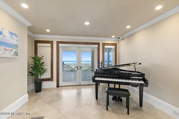 a kitchen with granite countertop a sink stove and cabinets