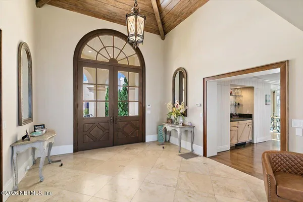 a kitchen with stainless steel appliances granite countertop a sink stove and wooden cabinets