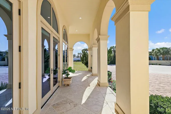 a view of entryway with stairs and wooden floor