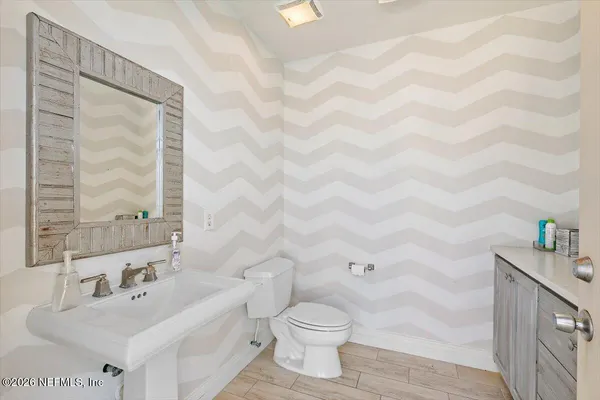 a view of a swimming pool with an outdoor seating