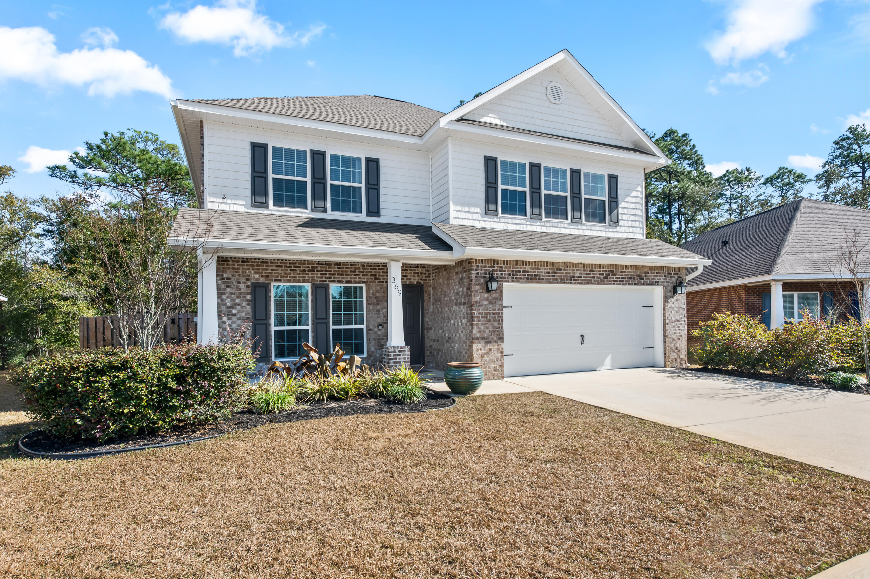 369 Wayne Trail Santa Rosa Beach, FL 32459 - Photo 46 of 47 front view of a house with a yard