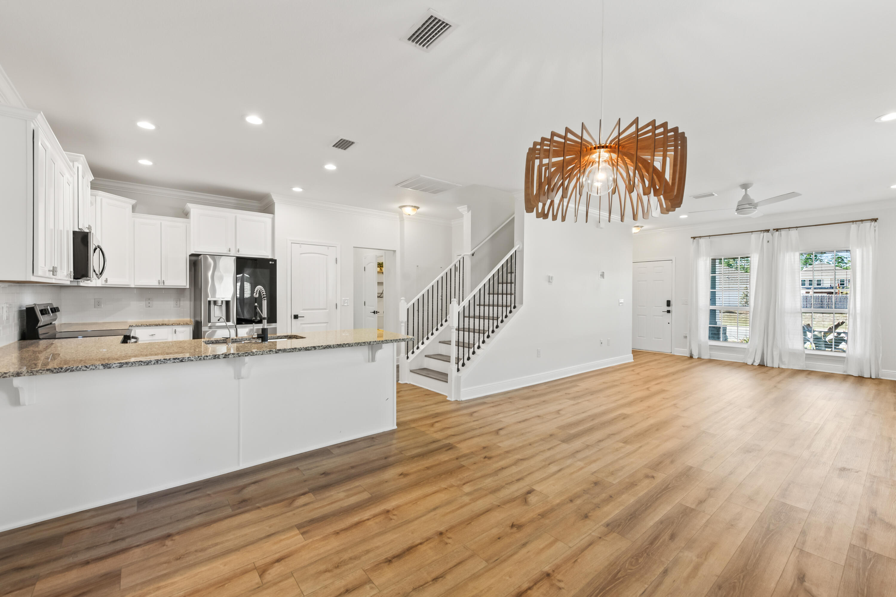 369 Wayne Trail Santa Rosa Beach, FL 32459 - Photo 5 of 47 a view of kitchen with furniture and wooden floor