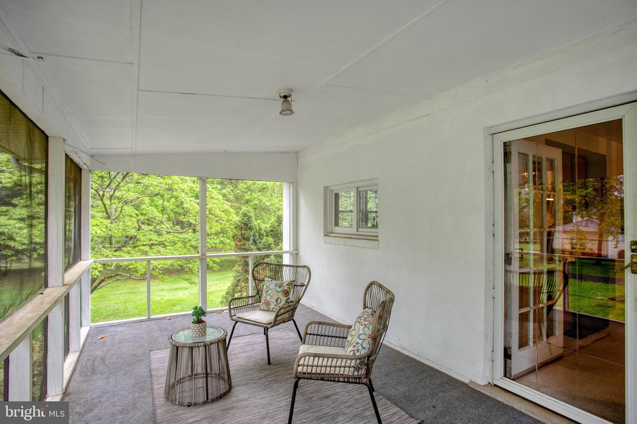 6105 Colchester Road Fairfax, VA 22030 - Photo 20 of 57 Screened porch off of kitchen