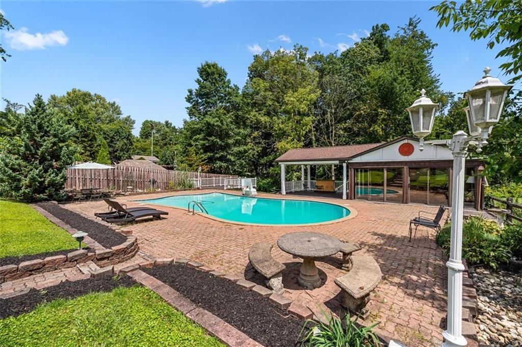 4 Dendron Drive Coraopolis, PA 15108 - Photo 29 of 36 a view of a house with backyard space and balcony