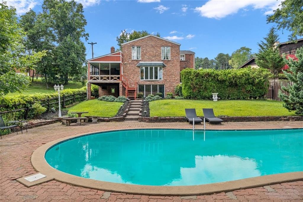 4 Dendron Drive Coraopolis, PA 15108 - Photo 31 of 36 a view of a swimming pool with a garden