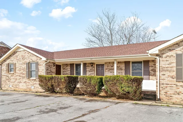a view of a house with a garden