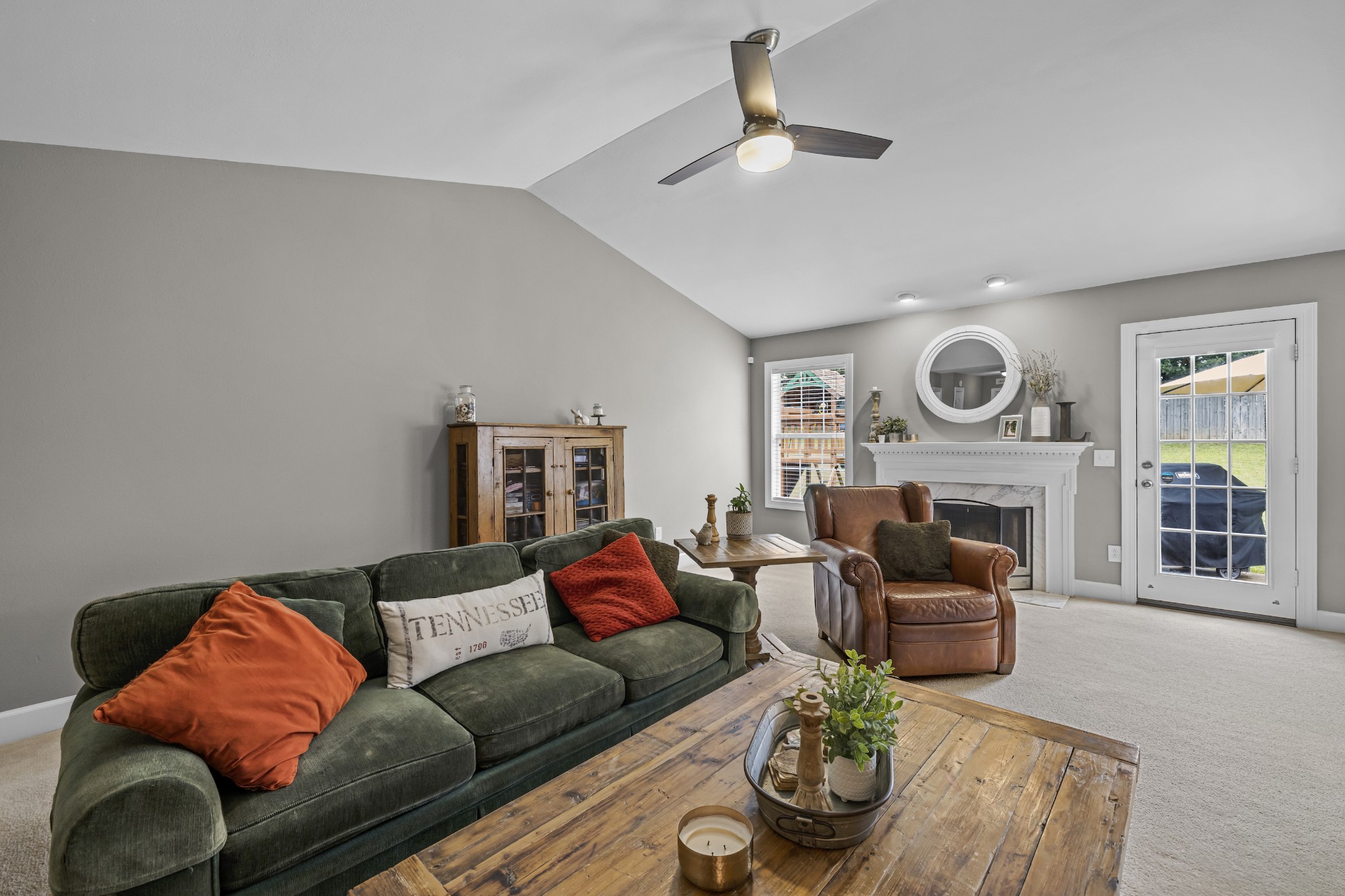 1936 Portway Road Spring Hill, TN 37174 - Photo 3 of 17 a living room with furniture fireplace and flat screen tv