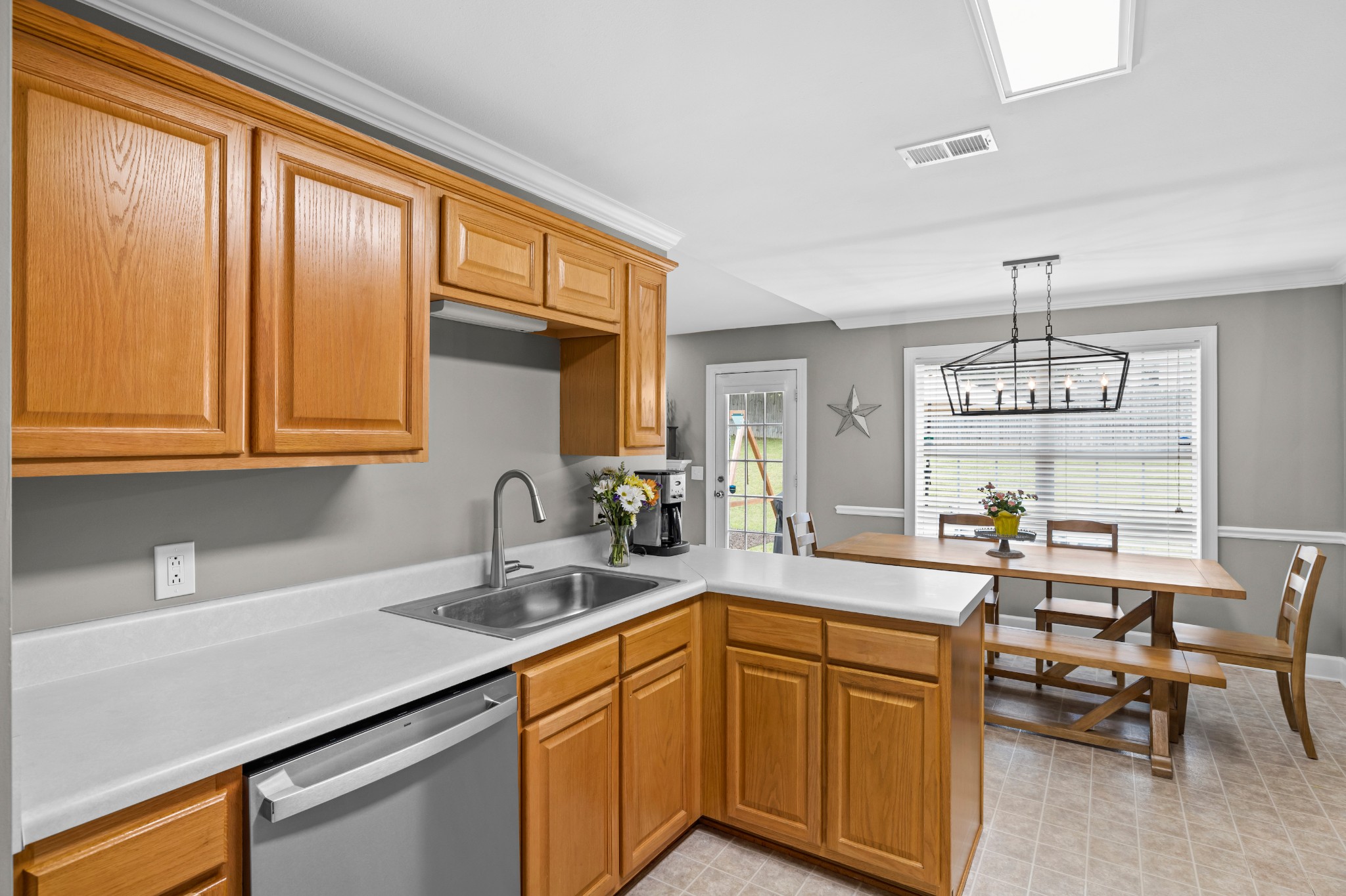 1936 Portway Road Spring Hill, TN 37174 - Photo 6 of 17 a kitchen with a sink cabinets and window