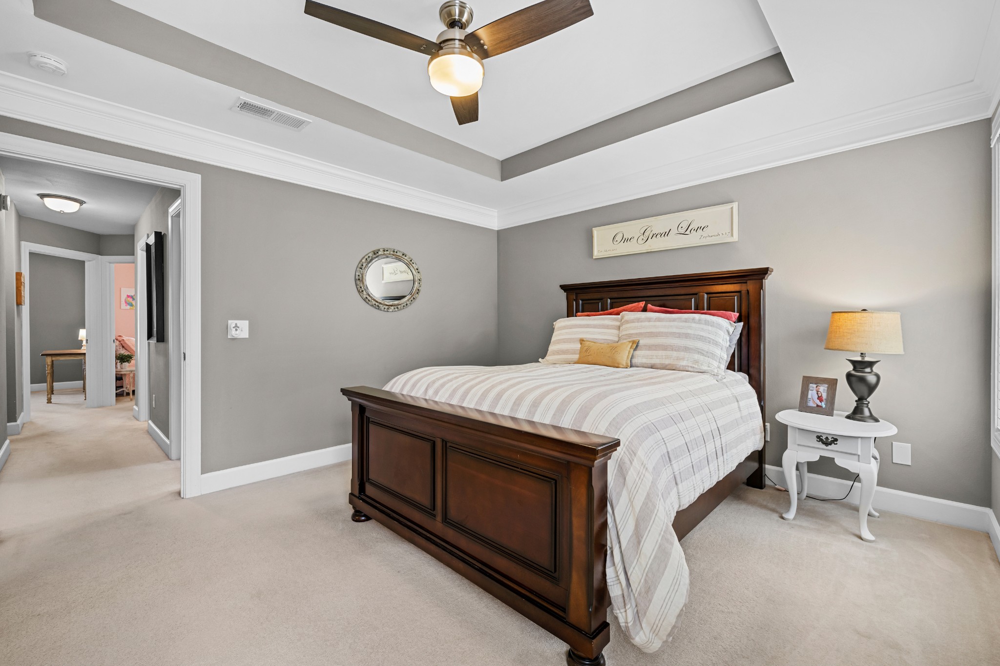 1936 Portway Road Spring Hill, TN 37174 - Photo 8 of 17 a bedroom with a bed and a chandelier
