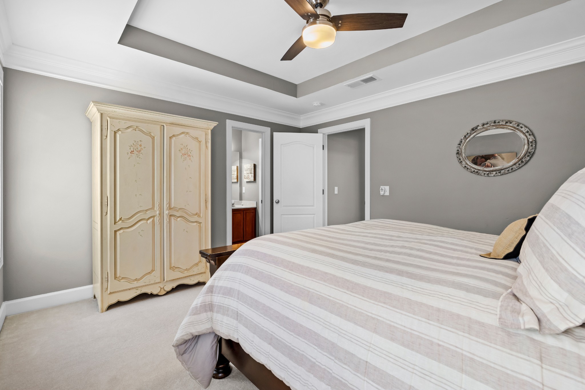 1936 Portway Road Spring Hill, TN 37174 - Photo 9 of 17 a bedroom with a bed and a chandelier