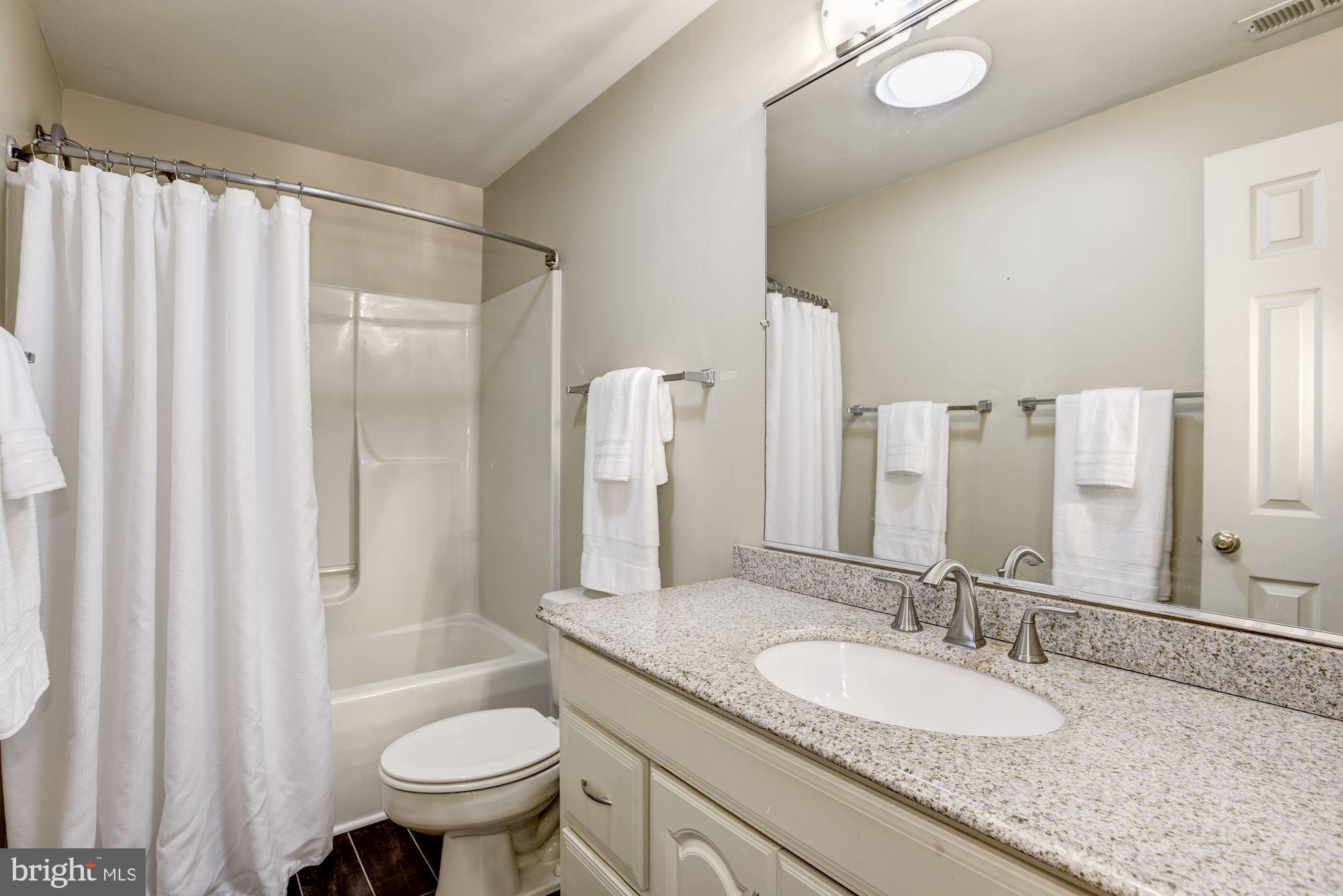 23249 Watson Road Leesburg, VA 20175 - Photo 36 of 51 Shared hall bath with updated flooring