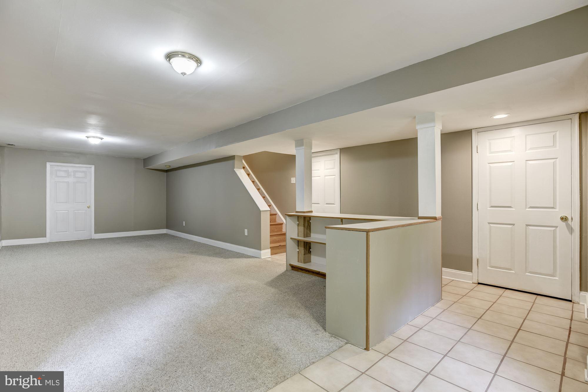 23249 Watson Road Leesburg, VA 20175 - Photo 42 of 51 Rec room with access to workshop and utility areas