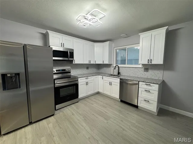 $249,900 | 725 Hazelvalley Drive, Hazelwood, MO 63042