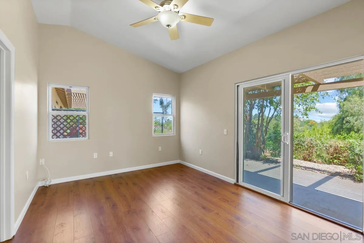 544 Alpine Trail Road Alpine, CA 91901 - Photo 45 of 52 wooden floor in an empty room with a window