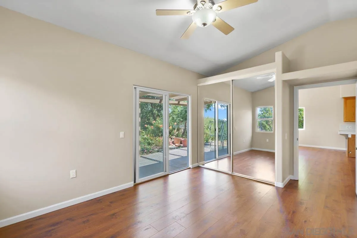 544 Alpine Trail Road Alpine, CA 91901 - Photo 46 of 52 wooden floor in an empty room with a window