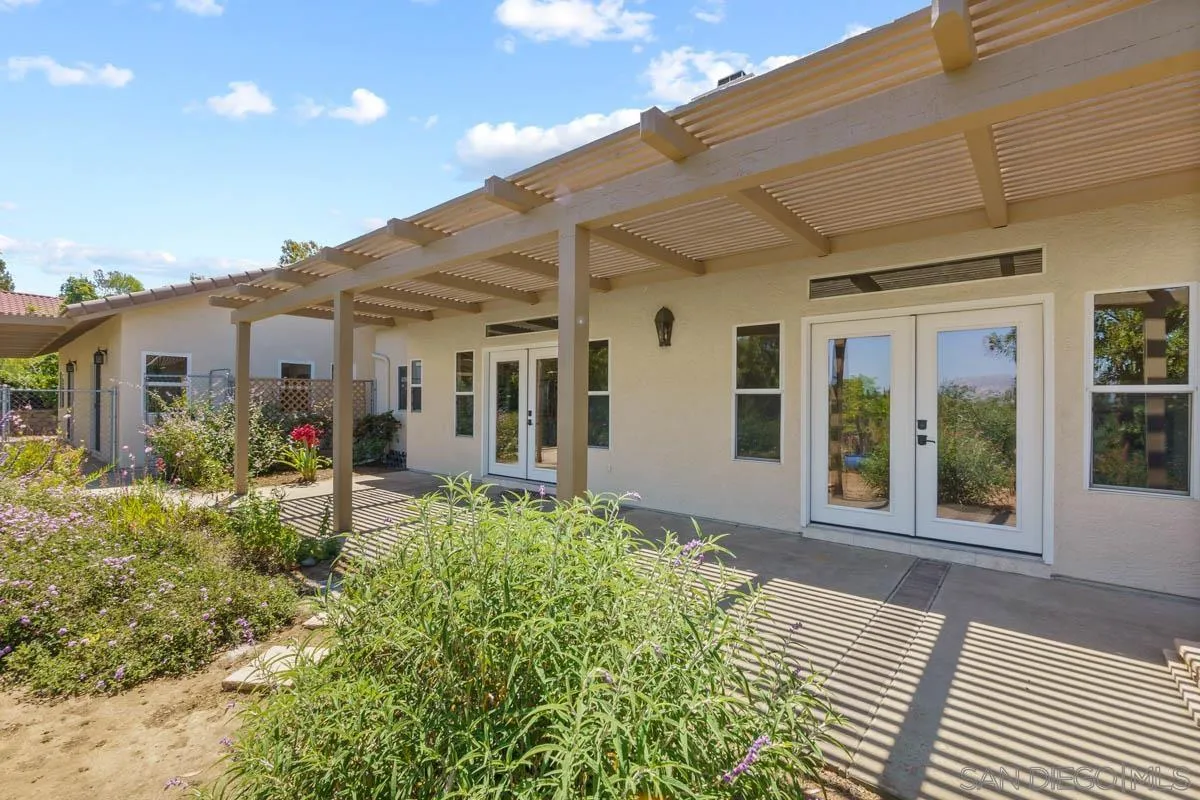 544 Alpine Trail Road Alpine, CA 91901 - Photo 7 of 52 a view of a house with backyard and porch