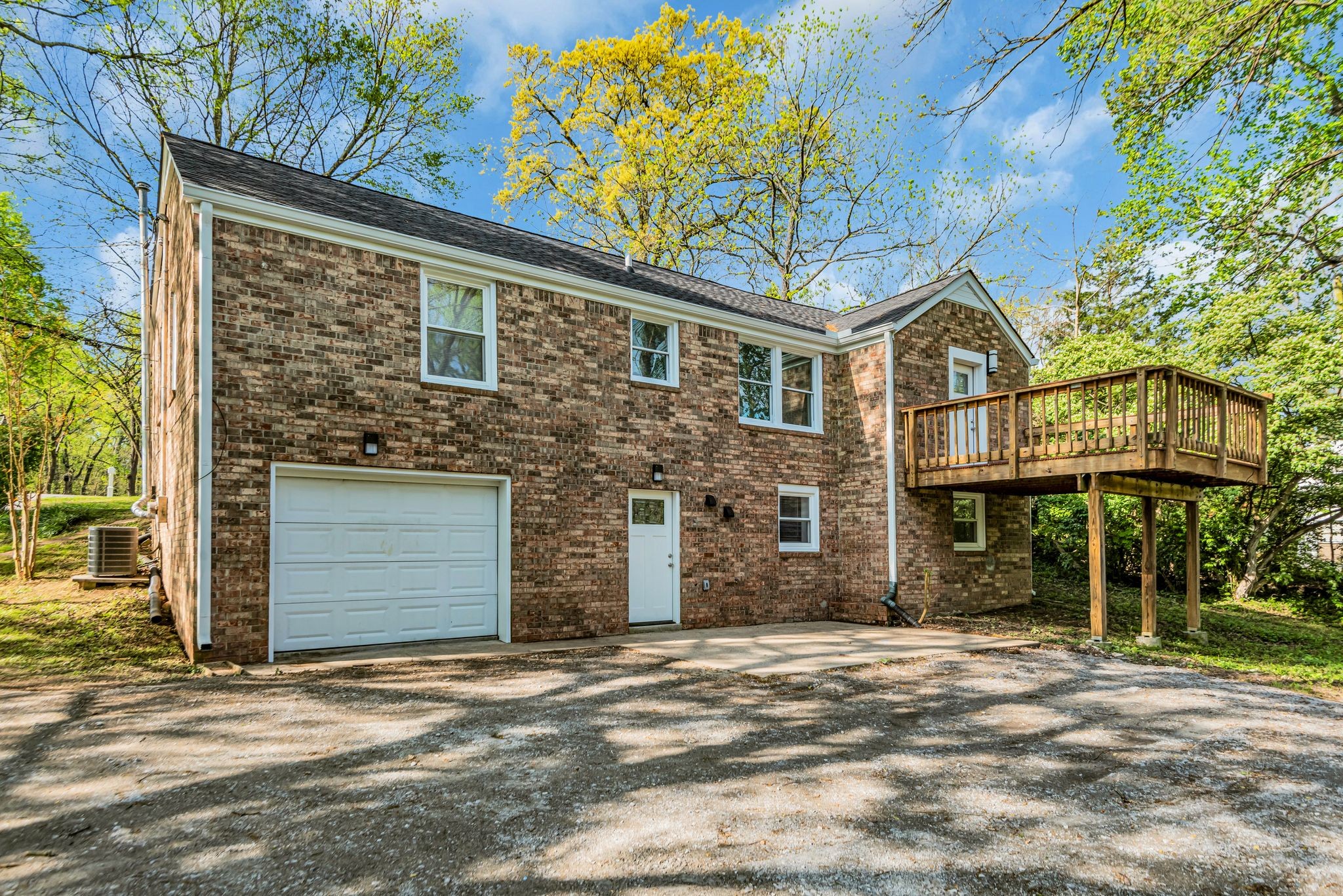1234 Currey Road Nashville, TN 37217 - Photo 17 of 18 front view of a house with a garden