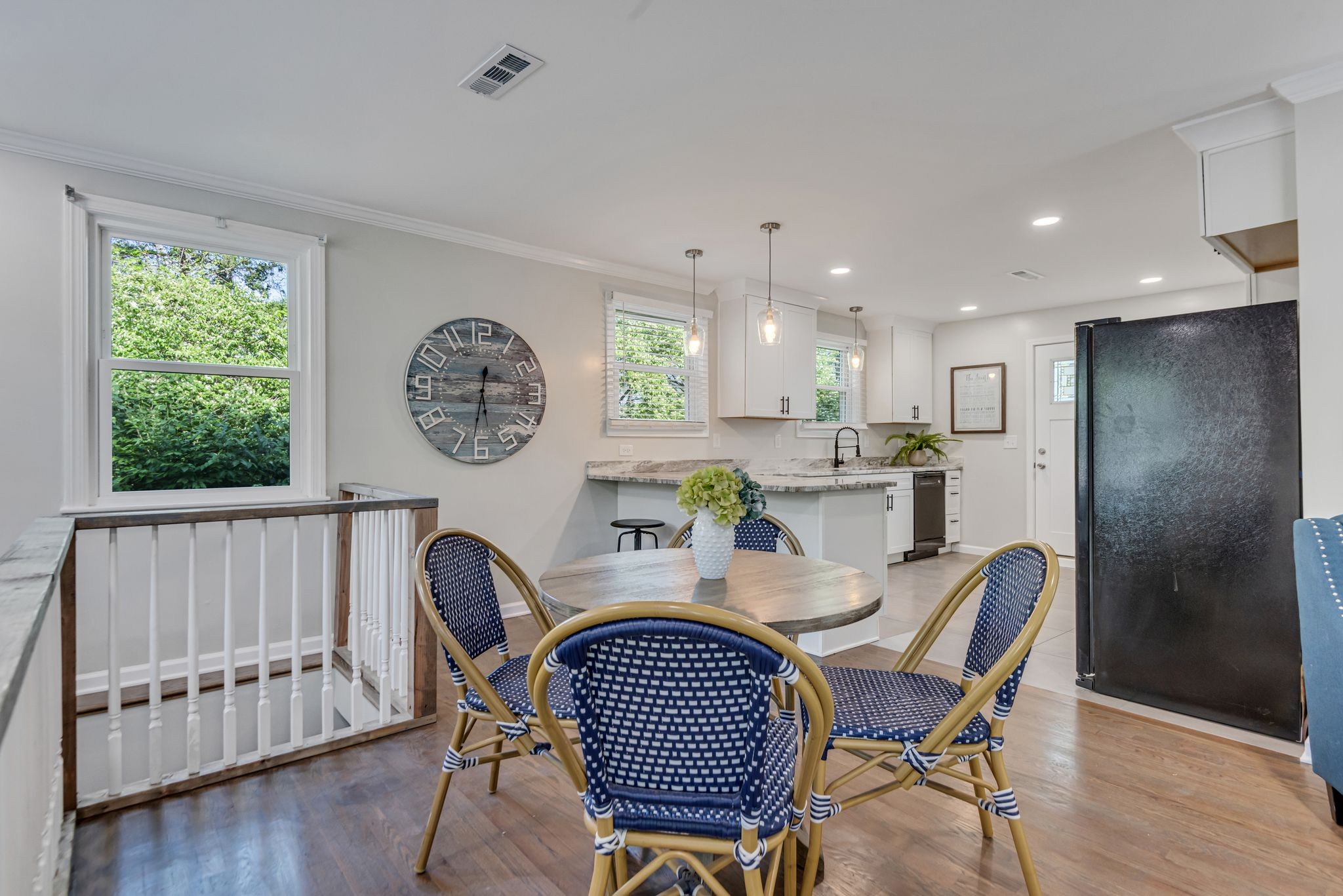 1234 Currey Road Nashville, TN 37217 - Photo 4 of 18 a dining room with furniture and a large window