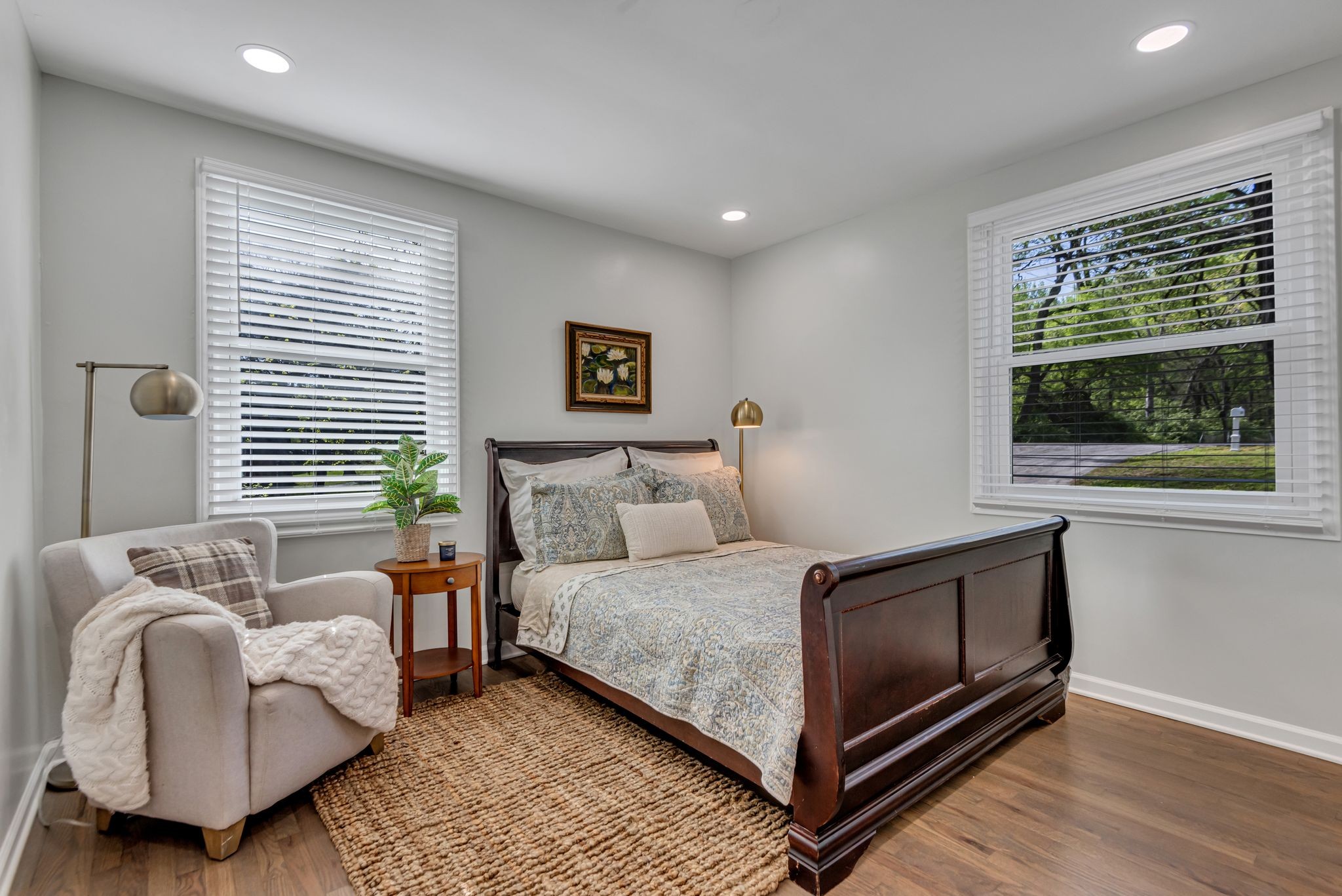 1234 Currey Road Nashville, TN 37217 - Photo 7 of 18 a bedroom with a bed and a couch