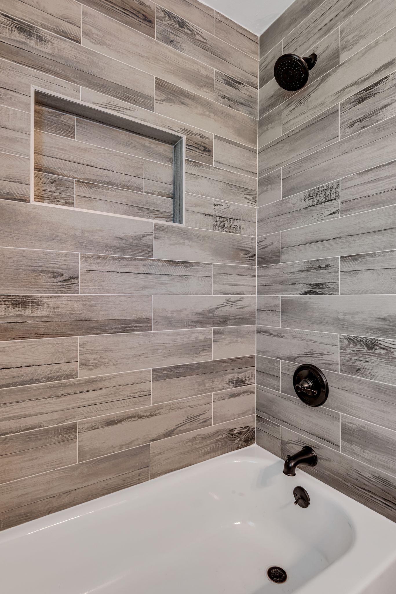 1234 Currey Road Nashville, TN 37217 - Photo 10 of 18 a bathroom with a bathtub