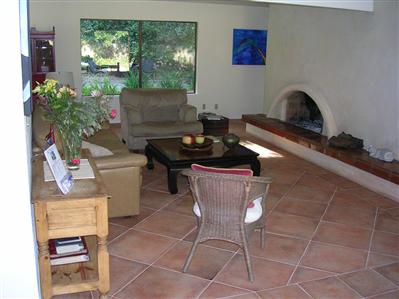 1230 Foothill Road Ojai, CA 93023 - Photo 7 of 7 a living room with furniture and a potted plant