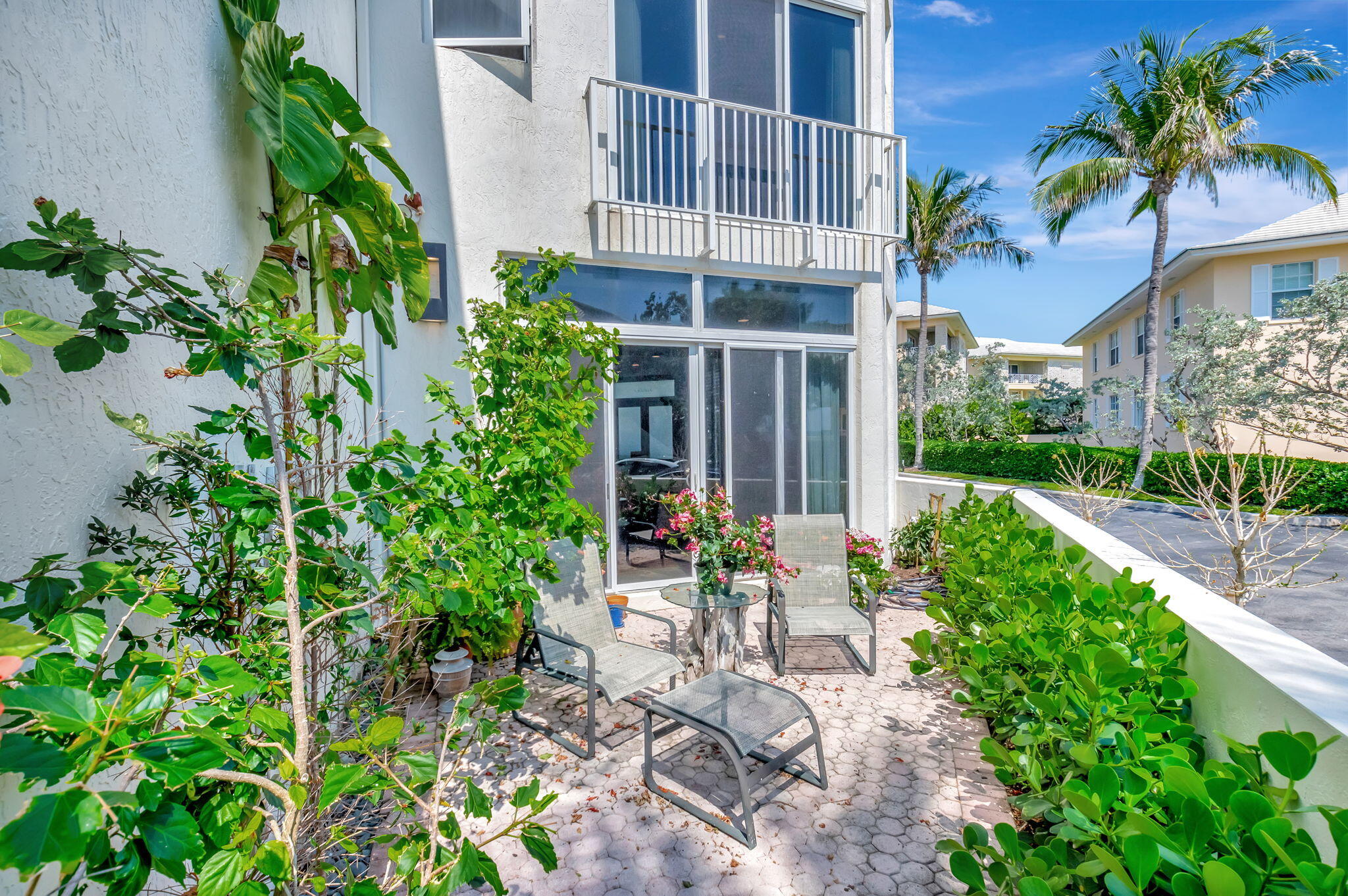 2115 South Ocean Boulevard, Unit 14 Delray Beach, FL 33483 - Photo 13 of 56 a view of an house with backyard and sitting area