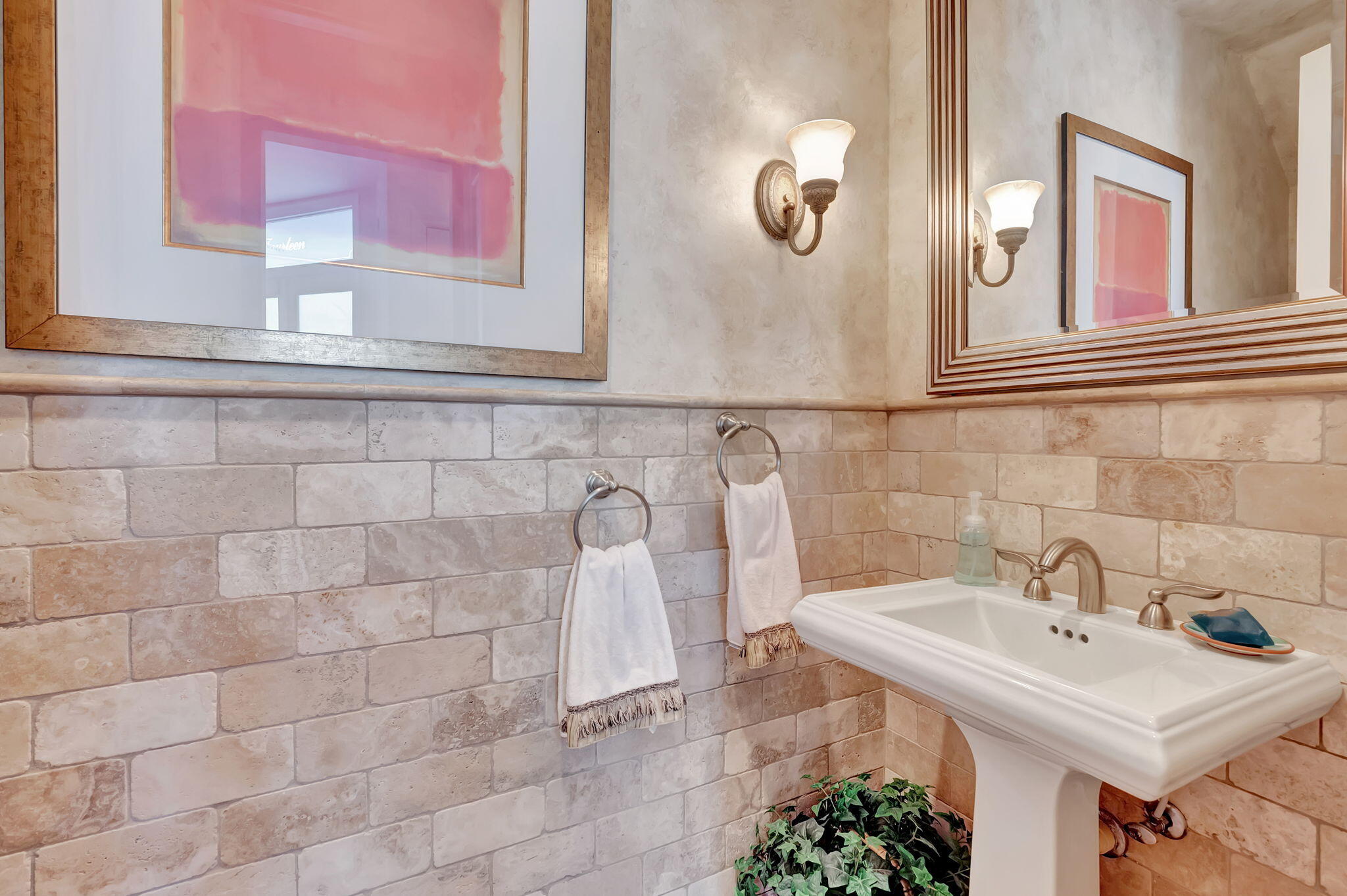 2115 South Ocean Boulevard, Unit 14 Delray Beach, FL 33483 - Photo 16 of 56 a bathroom with a sink and a mirror