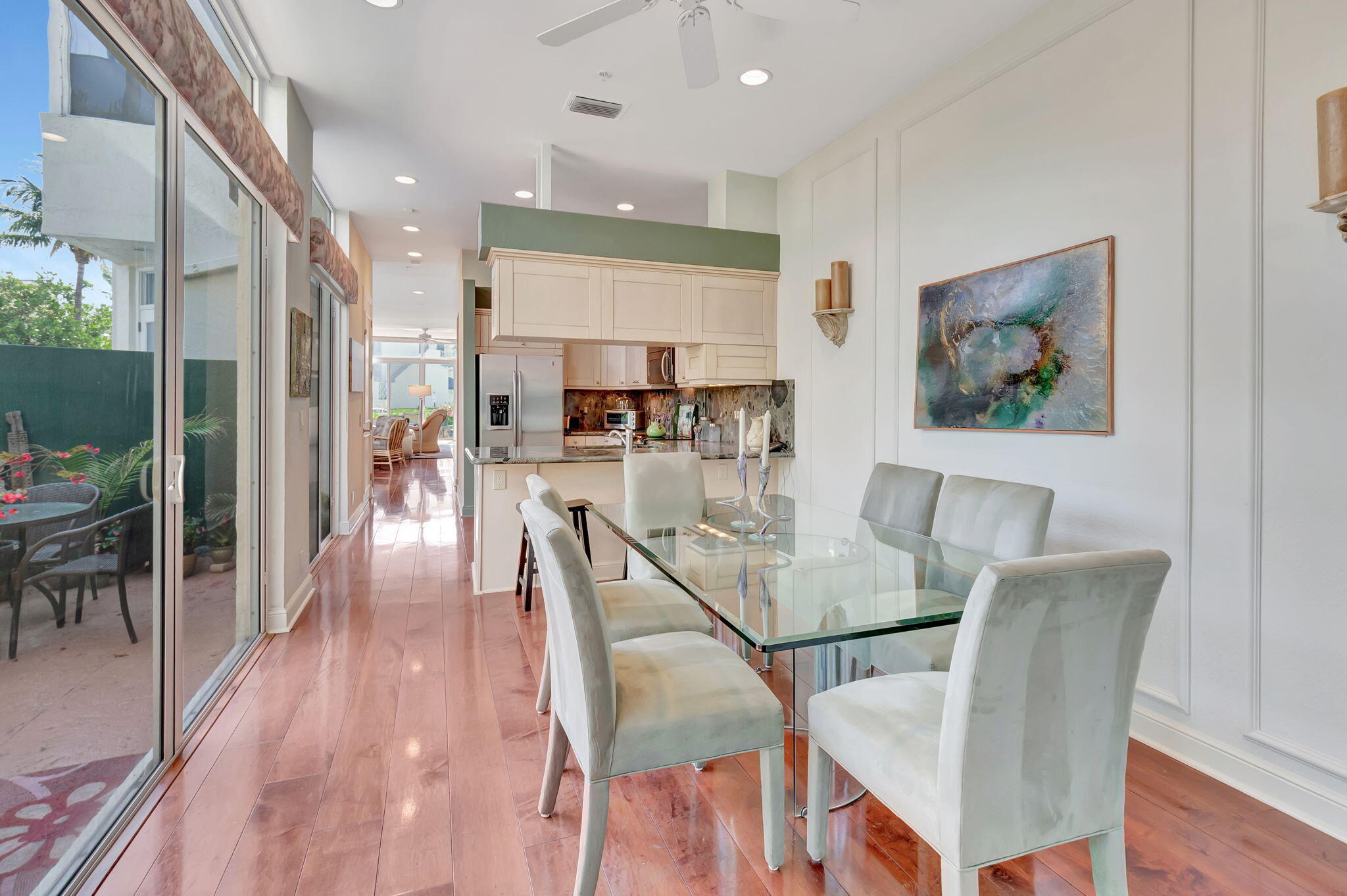 2115 South Ocean Boulevard, Unit 14 Delray Beach, FL 33483 - Photo 22 of 56 a view of a dining room with furniture and wooden floor