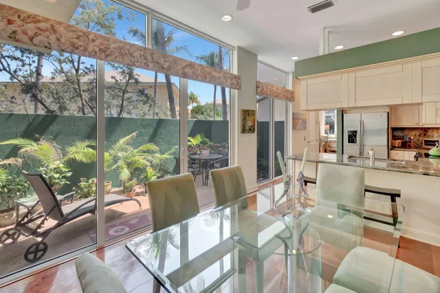 a outdoor dining space with furniture